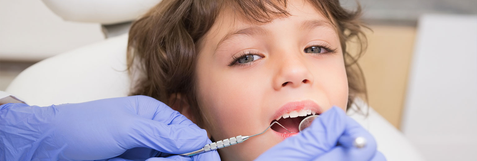 Kid having Pediatric Dental treatment